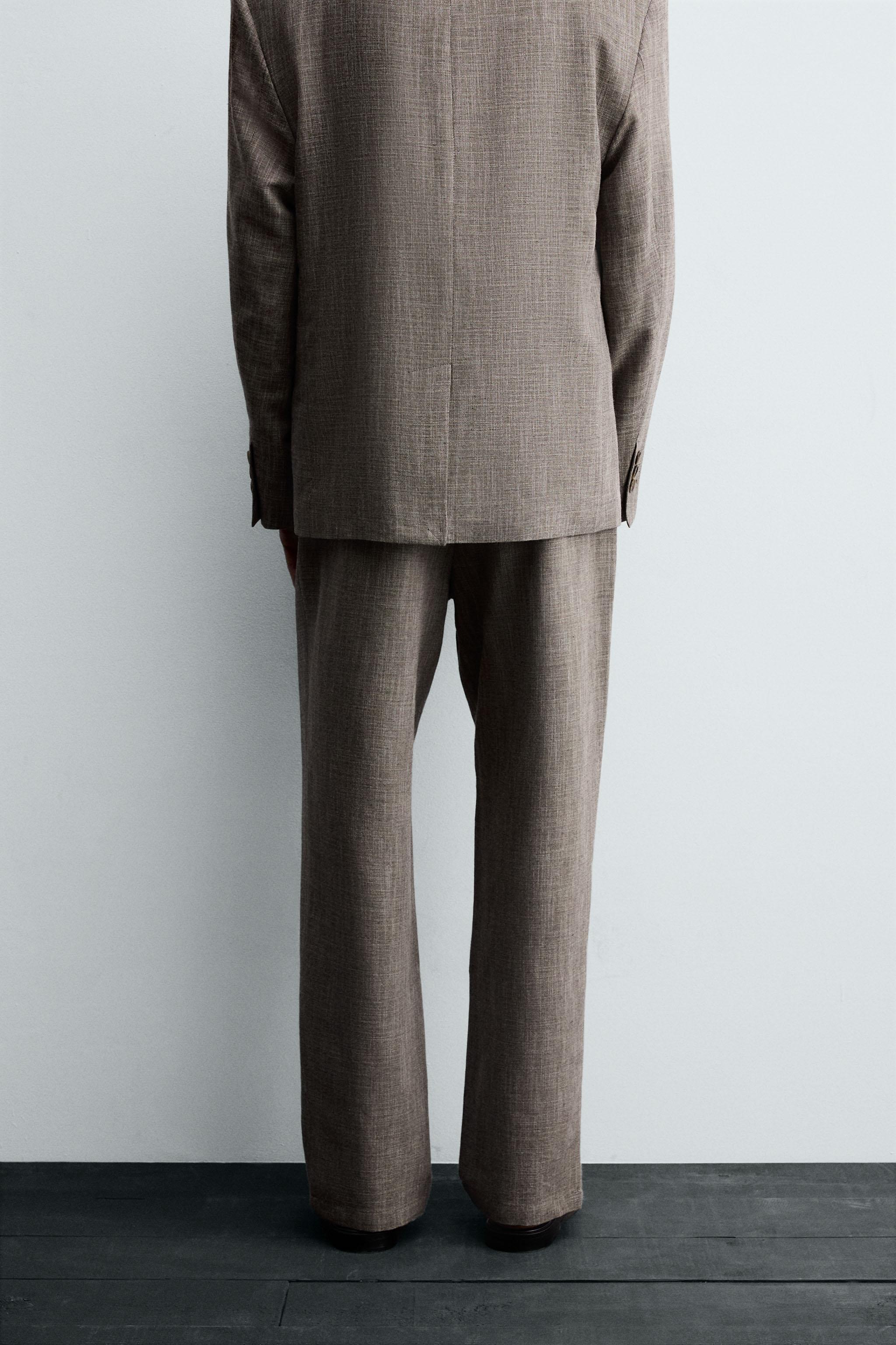 TEXTURED SUIT PANTS